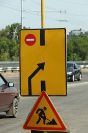 Traffic signs outdoors on highway. Road repair