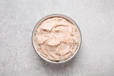 Photo of Delicious lard spread in bowl on light table, top view