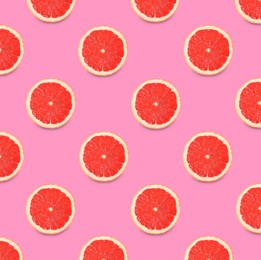 Many fresh ripe slices of grapefruits on pink background, flat lay. Seamless pattern design