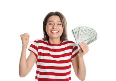 Emotional young woman with money on white background
