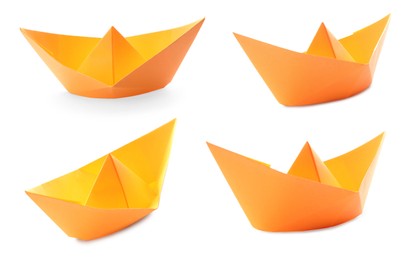 Set with orange paper boats on white background