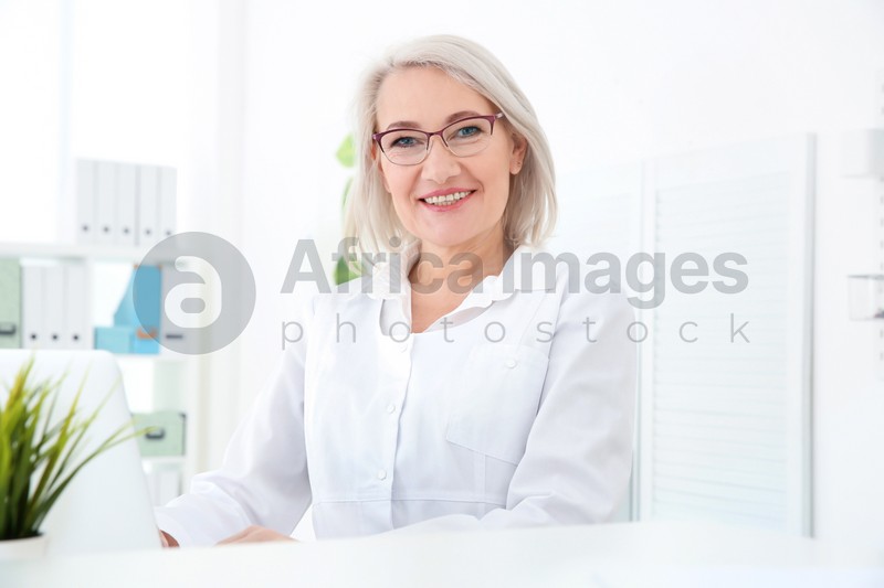 Senior female receptionist working in hospital