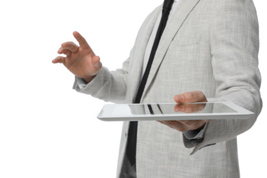 Businessman holding tablet computer on white background, closeup