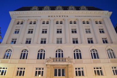 Vienna, Austria - June 20, 2018: Building of insurance company Helvetia in evening