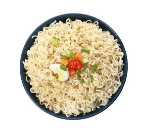 Photo of Tasty instant noodles with egg and vegetables in bowl isolated on white, top view