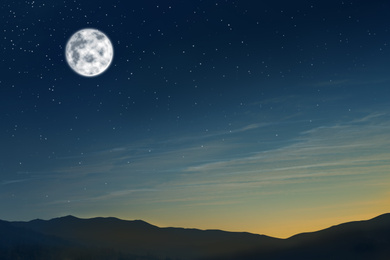 Beautiful landscape with full moon in night sky