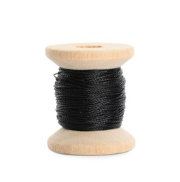Wooden spool of black sewing thread isolated on white