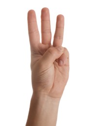 Teenage boy showing three fingers on white background, closeup