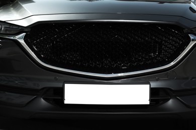 Car with vehicle registration plate, closeup. Mockup for design