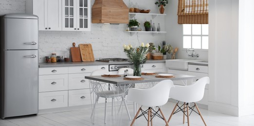 Beautiful kitchen interior with new stylish furniture. Banner design