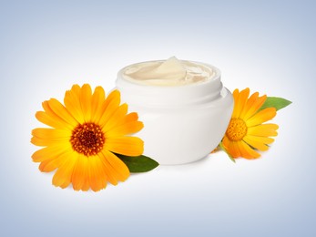 Body cream with calendula extract on light background. Natural based cosmetic product