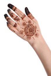 Woman with henna tattoo on hand against white background, closeup. Traditional mehndi ornament