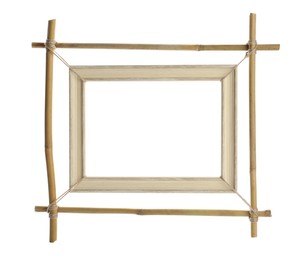 Photo of Empty frame made of bamboo sticks isolated on white