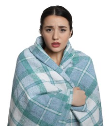 Young woman wrapped in blanket suffering from fever on white background. Cold symptoms