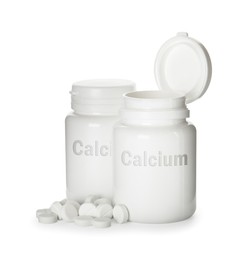 Calcium supplement. Bottles with pills on white background
