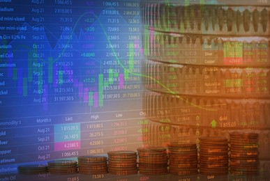 Image of Double exposure of electronic trading platform and stacked coins. Stock exchange