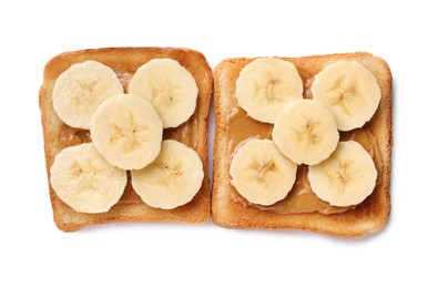 Tasty toasts with nut butter and banana slices on white background, top view