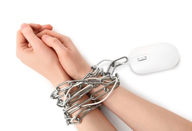 Woman chained to computer mouse on white background, top view. Internet addiction