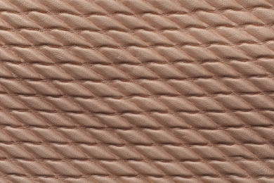 Texture of brown leather as background, closeup