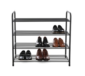 Stylish shelving unit with different pairs of shoes on white background. Storage idea