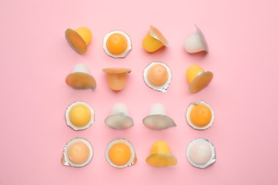 Tasty bright jelly cups on pink background, flat lay