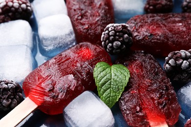 Tasty blackberry ice pops, closeup. Fruit popsicle