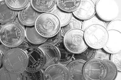 Many Ukrainian coins as background, top view. National currency
