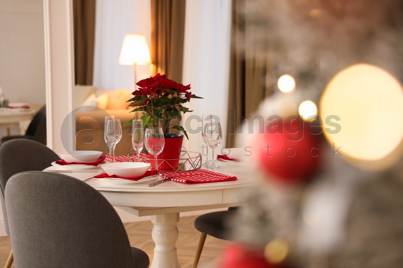 Beautiful Christmas table setting indoors. Interior design