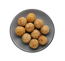 Photo of Plate of delicious sesame balls on white background, top view