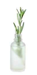 Bottle of essential oil and rosemary isolated on white