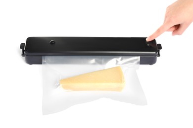 Woman packing cheese using vacuum sealer on white background, closeup
