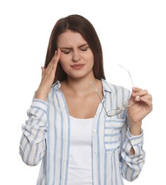 Young woman suffering from eyestrain on white background