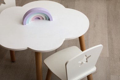 Small table and chairs in baby room, closeup
