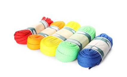 Packed colorful shoe laces on white background