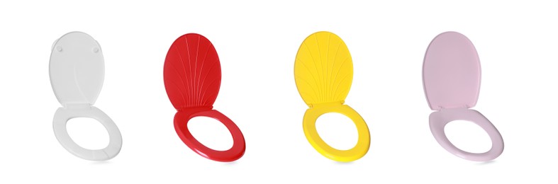 Set with different plastic toilet seats on white background. Banner design