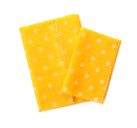 Reusable beeswax food wraps on white background, top view