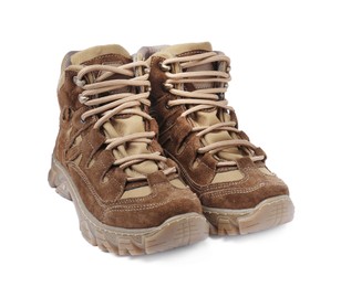 Pair of comfortable hiking boots on white background. Camping tourism
