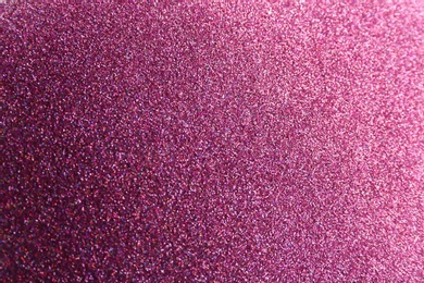 Closeup view of sparkling violet glitter background