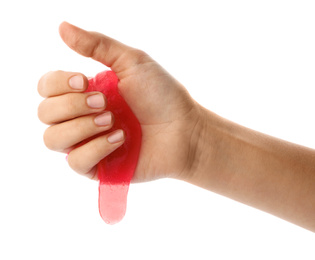 Woman playing with pink slime isolated on white, closeup. Antistress toy