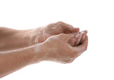 Man washing hands with soap on white background, closeup