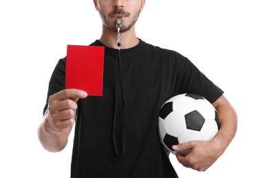 Football referee with ball and whistle holding red card on white background, closeup