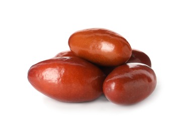 Heap of ripe red dates on white background