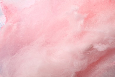 Sweet pink cotton candy as background, closeup view
