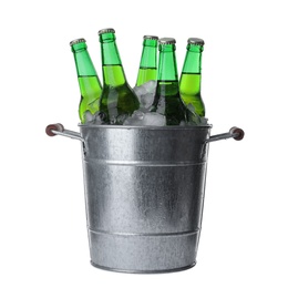 Photo of Metal bucket with bottles of beer and ice cubes isolated on white