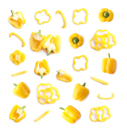 Image of Set of ripe yellow bell peppers on white background, top view