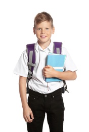 Photo of Cute boy with school stationery on white background