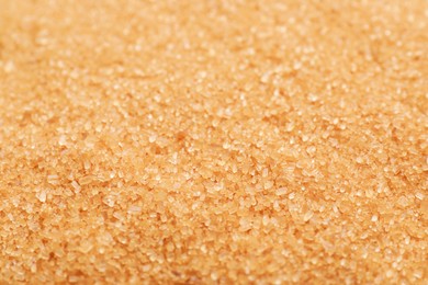 Pile of brown sugar as background, closeup