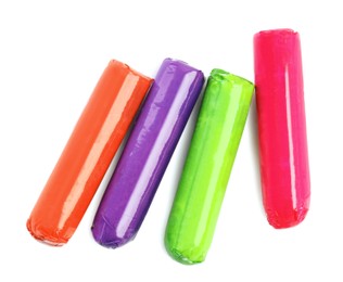 Colorful tampons on white background, top view. Menstrual hygiene product