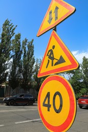Traffic signs on city street. Road repair