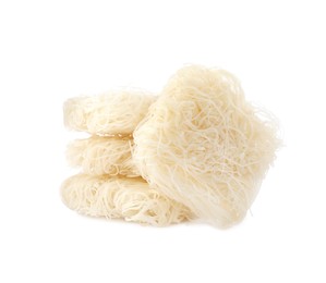 Bricks of dried rice noodles isolated on white. East Asian cuisine